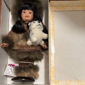 Adorable Brown and White Doll with Plush Toy